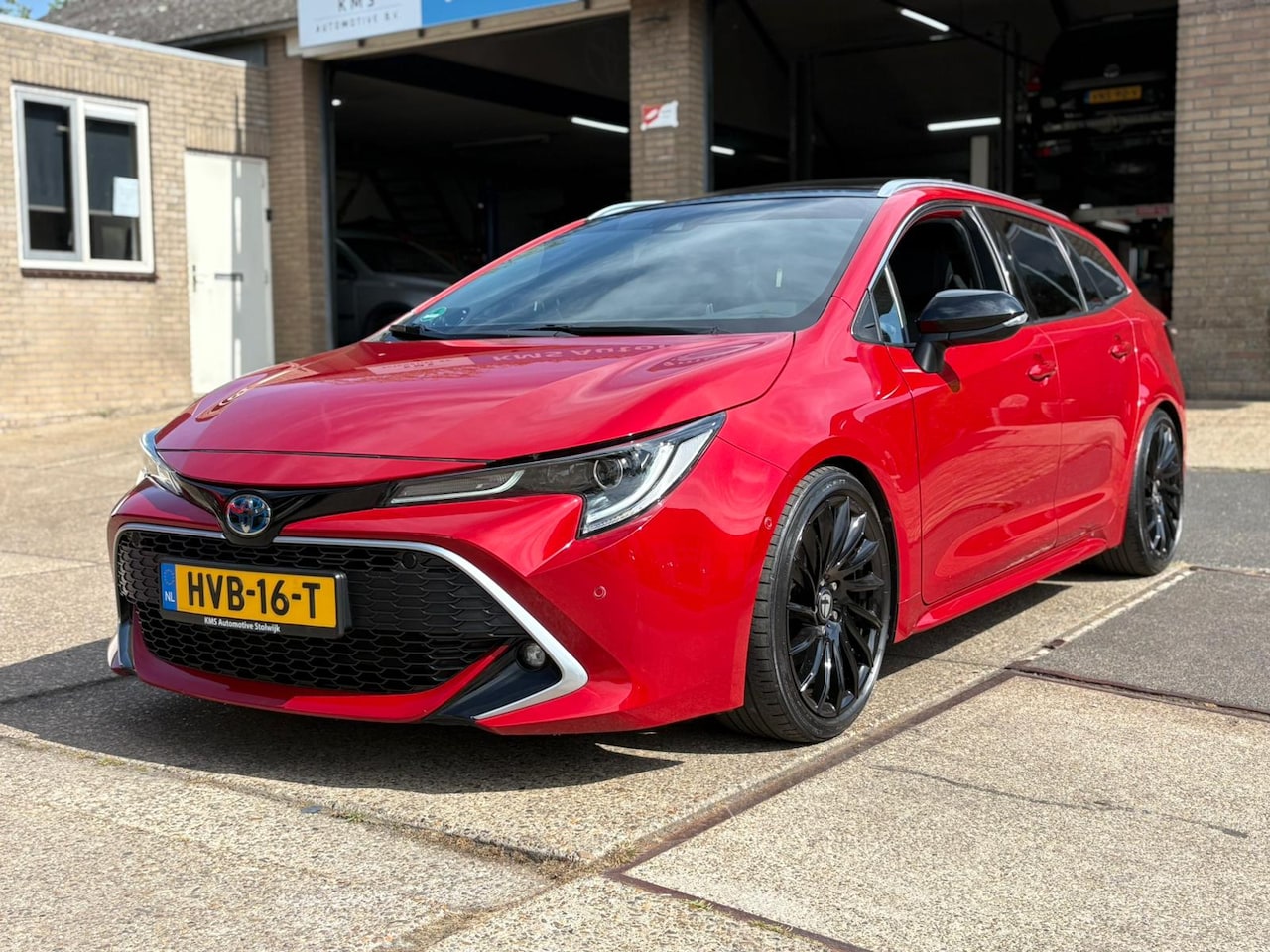 Toyota Corolla Touring Sports - 2.0 Hybrid Executive LED, Open dak, Trekhaak, Sportstoelen - AutoWereld.nl