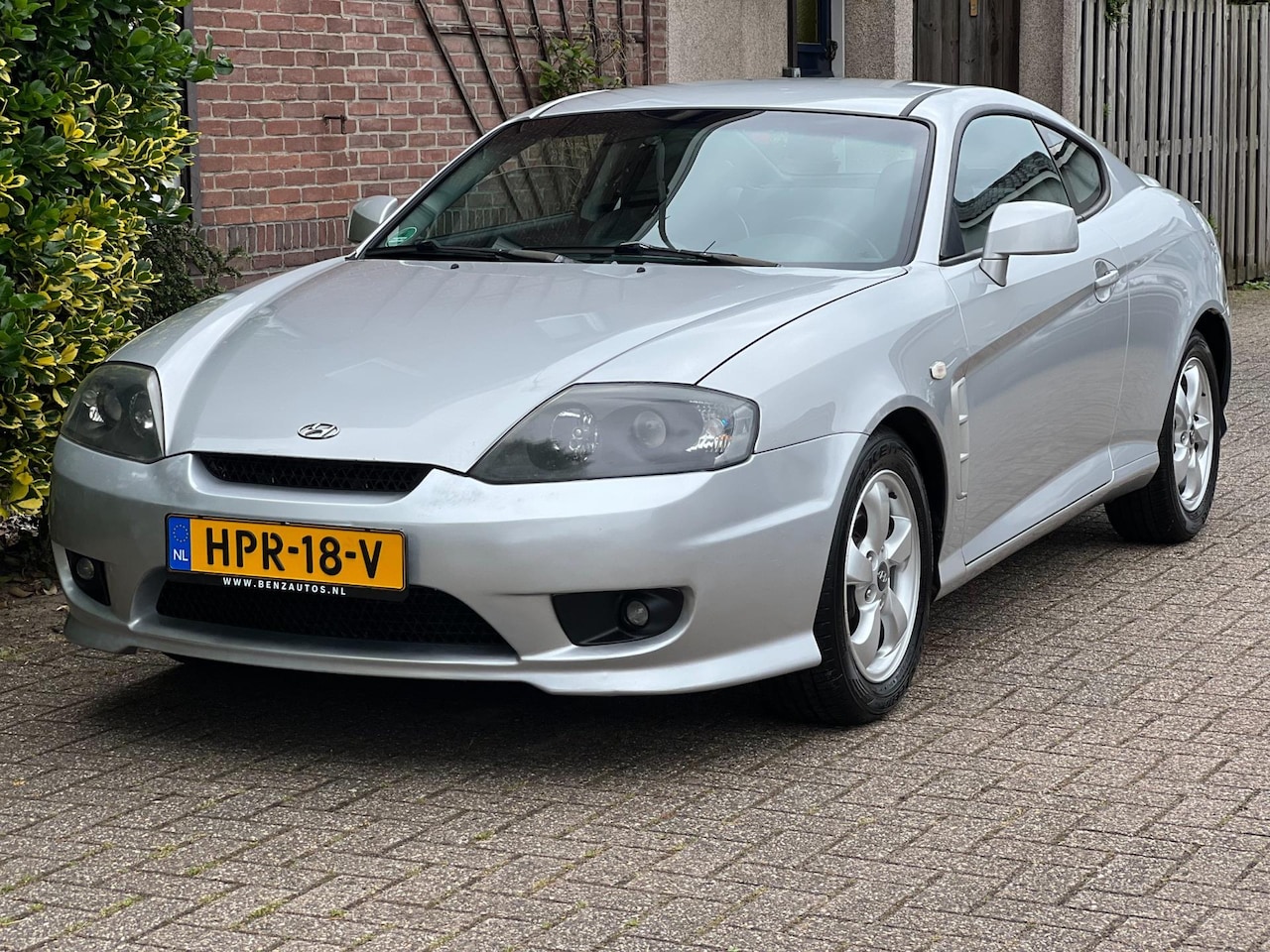 Hyundai Coupé - 2.0i-16V Dynamic Airco/Lage km - AutoWereld.nl