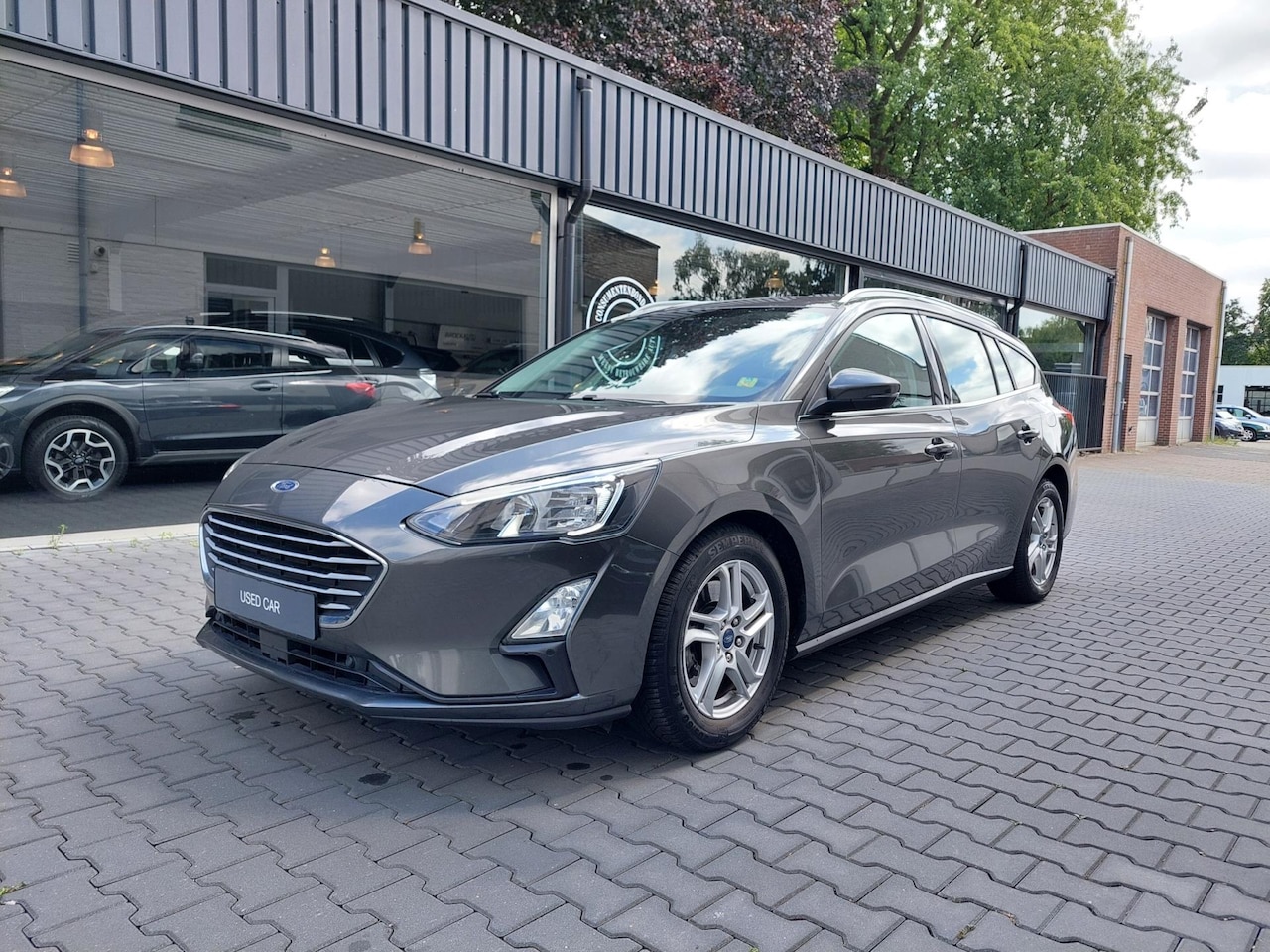 Ford Focus Wagon - 1.0 Connected 85.000KM Apple Carplay Trekhaak Navi Clima Telefoon 16 inch Achteruitrijcame - AutoWereld.nl