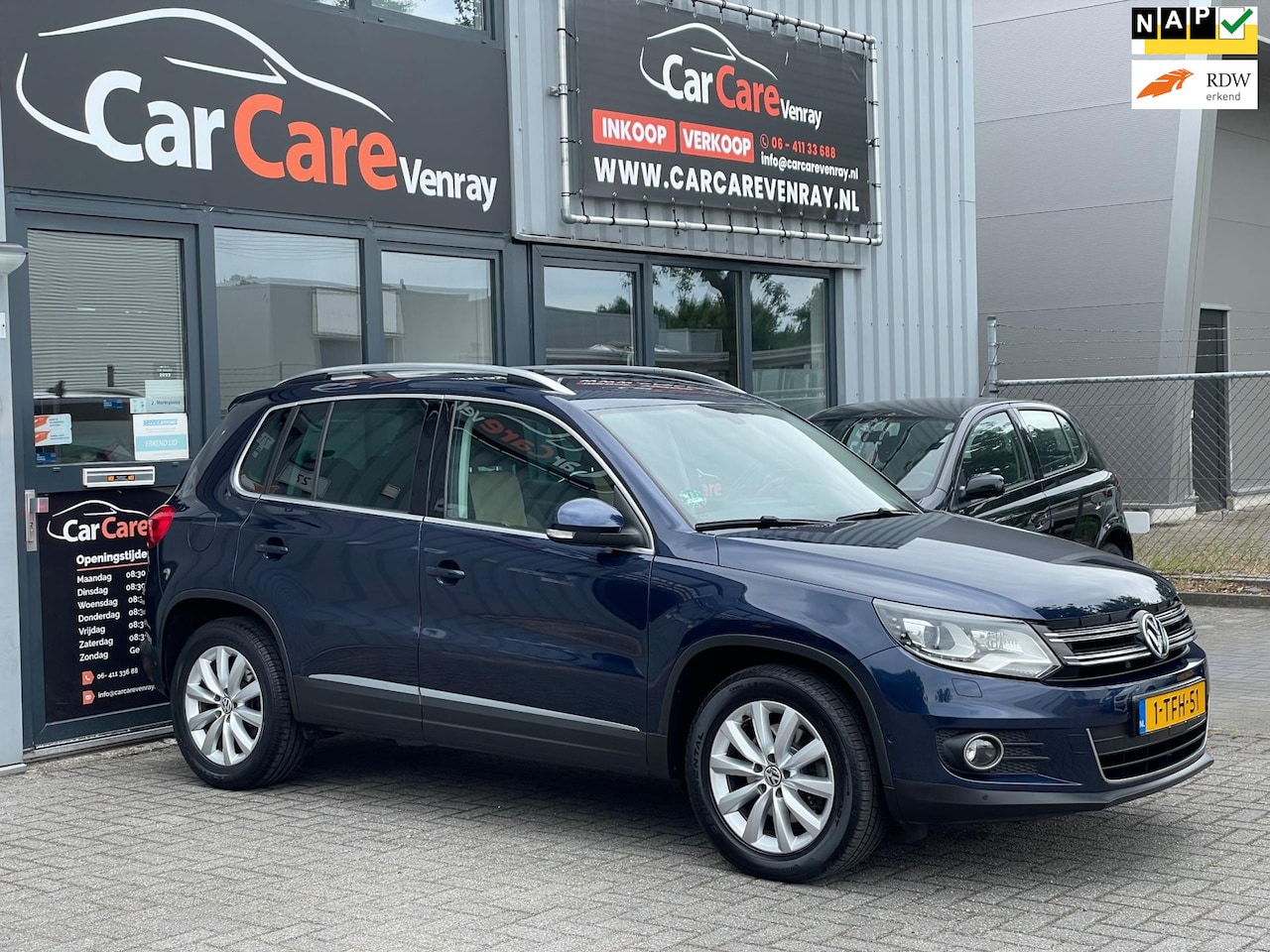 Volkswagen Tiguan - 1.4 TSI Sport&Style|APK01-2026|NAVIGATIE|CAMERA|NAP|CRUISECONTROLE| - AutoWereld.nl