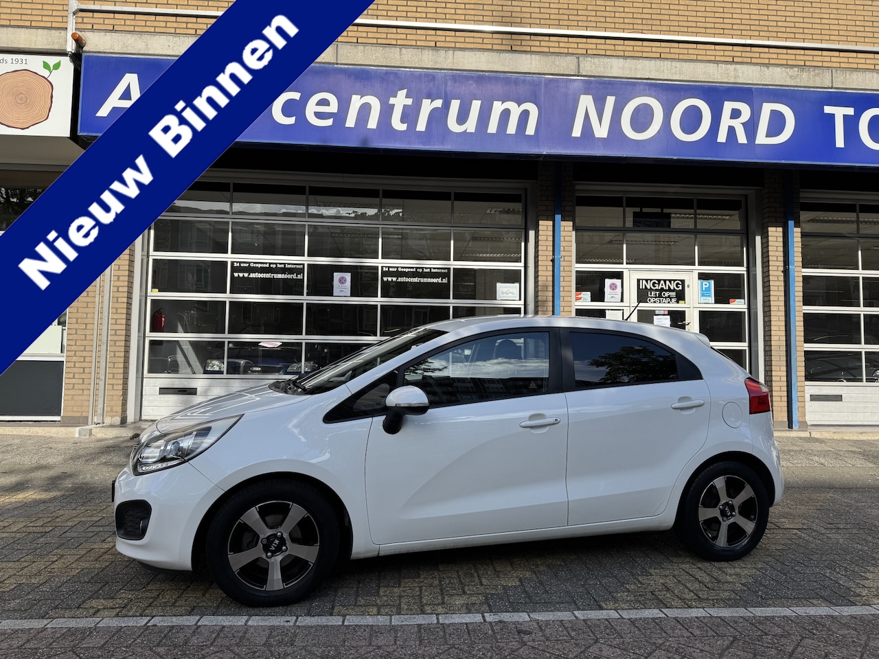 Kia Rio - 1.2 CVVT Plus Pack 91934KM! NAP | Airco | 5 drs | Lichtmetalen Velgen | Dealeronderhouden - AutoWereld.nl