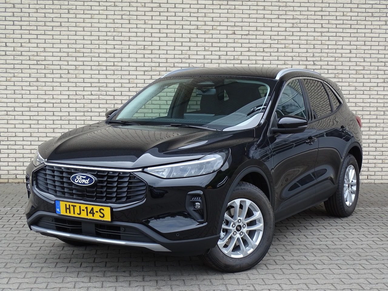 Ford Kuga - 2.5 PHEV 243pk Titanium | winterpack | cruise. | camera | led koplampen - AutoWereld.nl