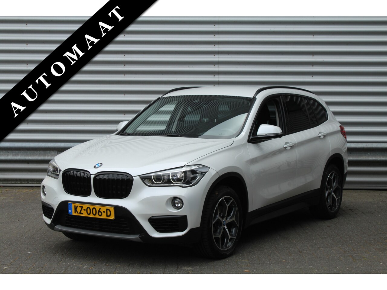 BMW X1 - sDrive18i 136pk Centennial Executive AUTOMAAT NL-Auto NAP Clima Cruise Navi PDC 17"LMV Afn - AutoWereld.nl