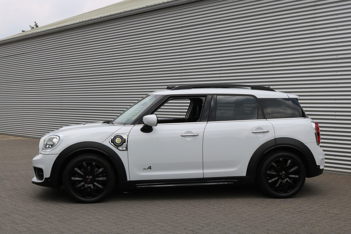 MINI Countryman - 2.0 Cooper S E ALL4 Mini 2.0 Cooper S E ALL4 (Panoramadak Sportleder Navi/Camera Carplay HarmanKardon HeadUp K - AutoWereld.nl