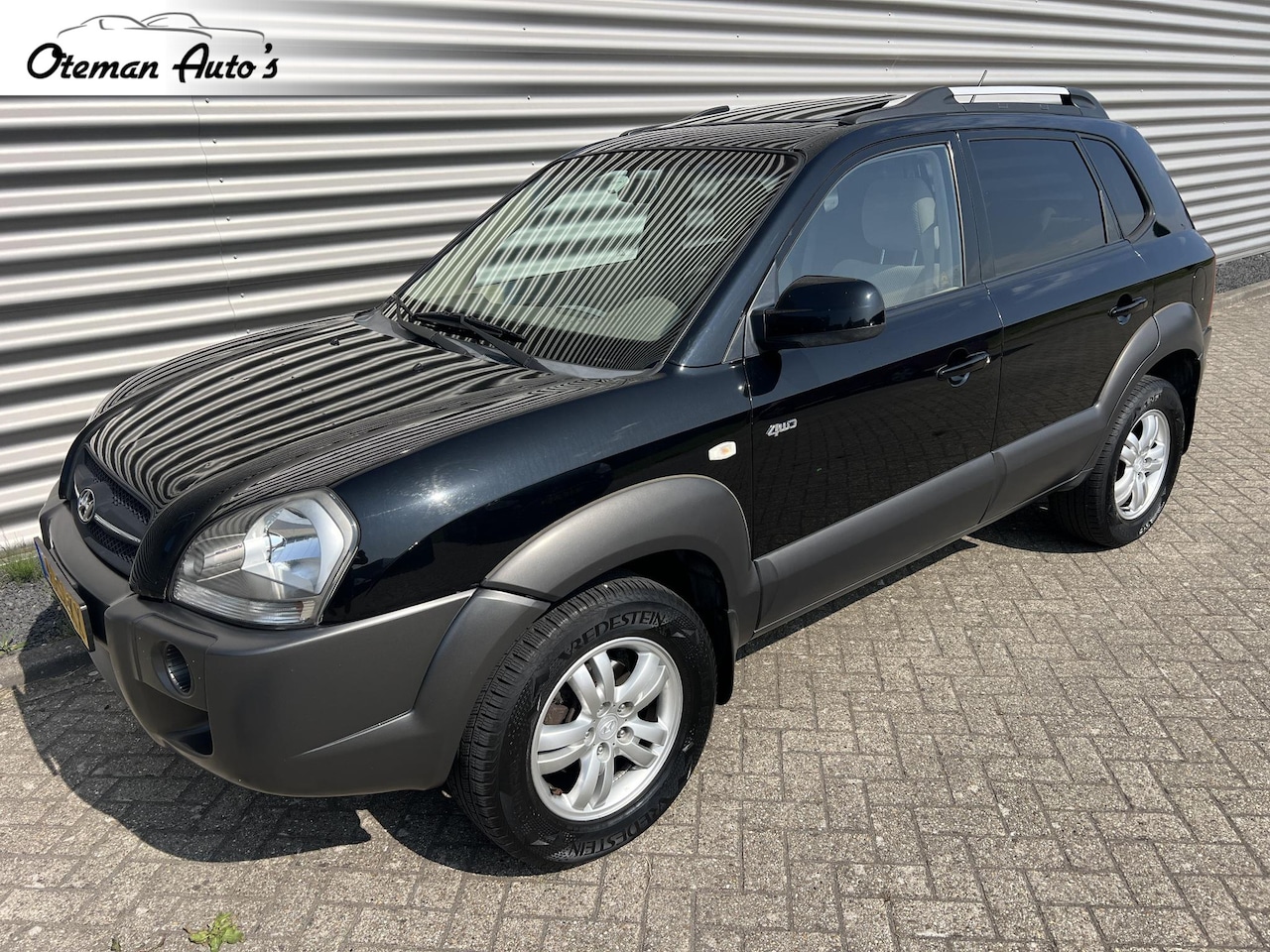 Hyundai Tucson - 2.0i 4WD Style Trekhaak Schuifdak - AutoWereld.nl