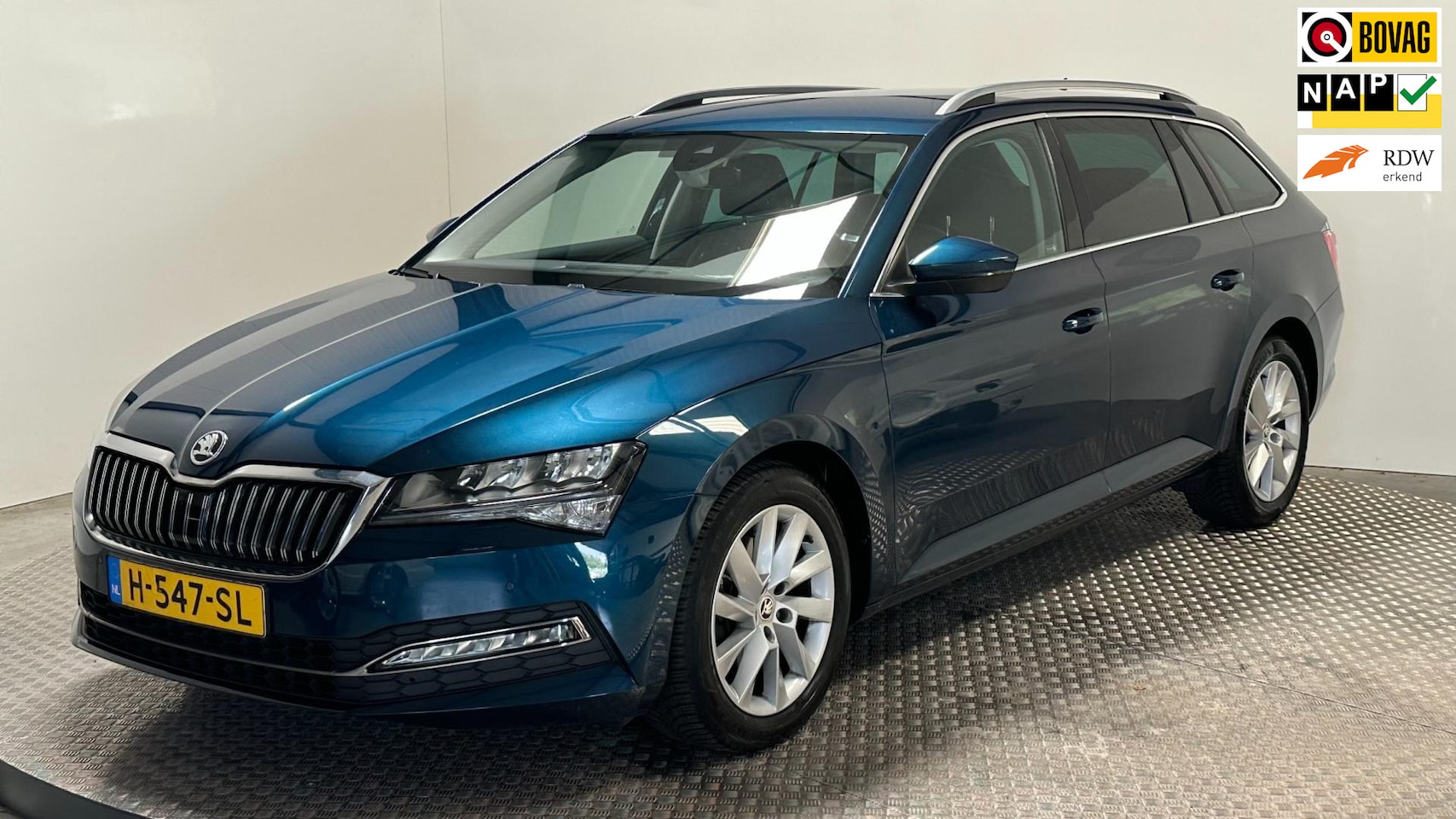 Skoda Superb Combi - 1.5 TSI ACT Business Edition benzine parkeersensoren navigatie stoelverwarming cruisecontr - AutoWereld.nl