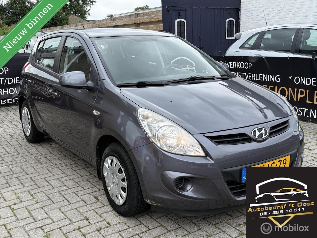 Hyundai i20 - 1.2i i-Drive boekjes erbij airco, trekhaak 5drs - AutoWereld.nl
