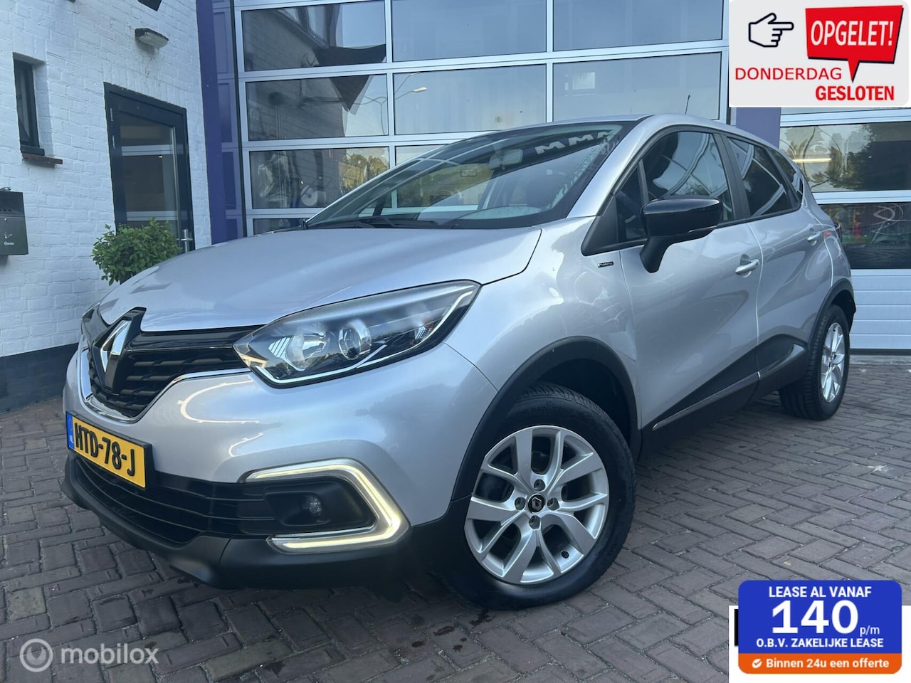 Renault Captur - 0.9 TCe Limited * AIRCO * NAVIGATIE * CAMERA - AutoWereld.nl