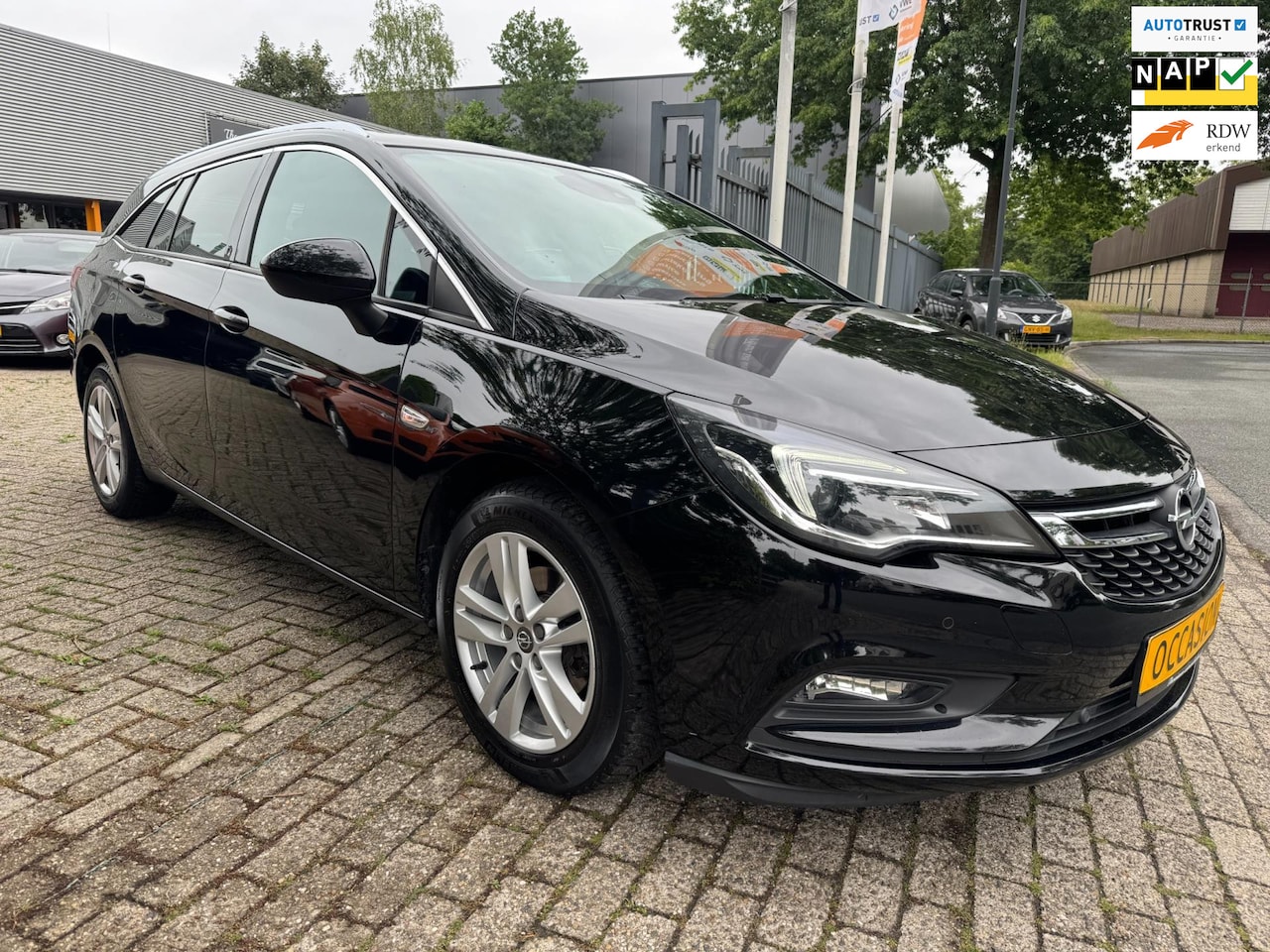 Opel Astra Sports Tourer - 1.4 Business Executive automaat, elec pakket, navi, adap cruise, trekhaak, pdc, multi-stuu - AutoWereld.nl