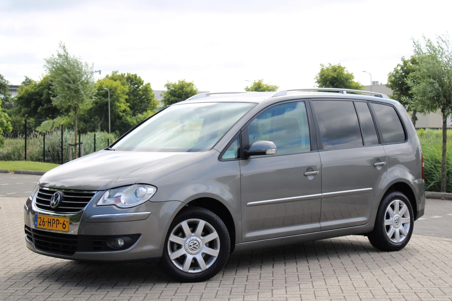 Volkswagen Touran - 1.4 TSI Highline l Clima l PDC l Cruise - AutoWereld.nl