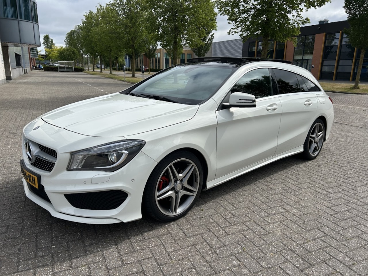 Mercedes-Benz CLA-klasse Shooting Brake - 180 Ambition AMG SCHUIF/PANODAK STOEVW NAVI. - AutoWereld.nl