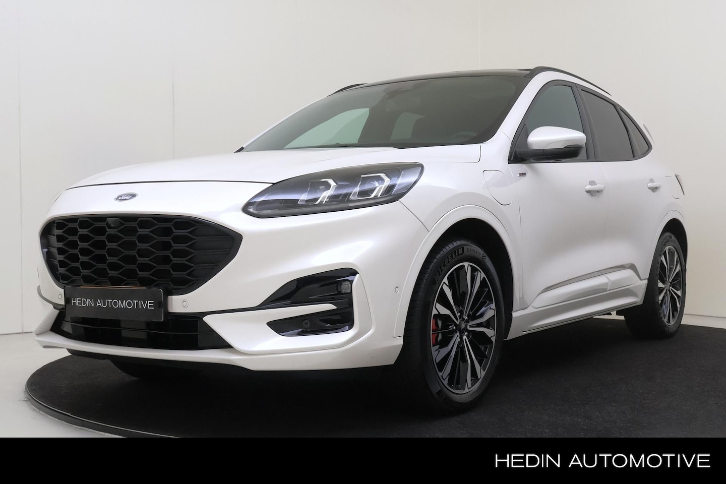 Ford Kuga - 2.5 PHEV ST-Line X | Panoramadak | Winter Pack | HU | 19 inch - AutoWereld.nl