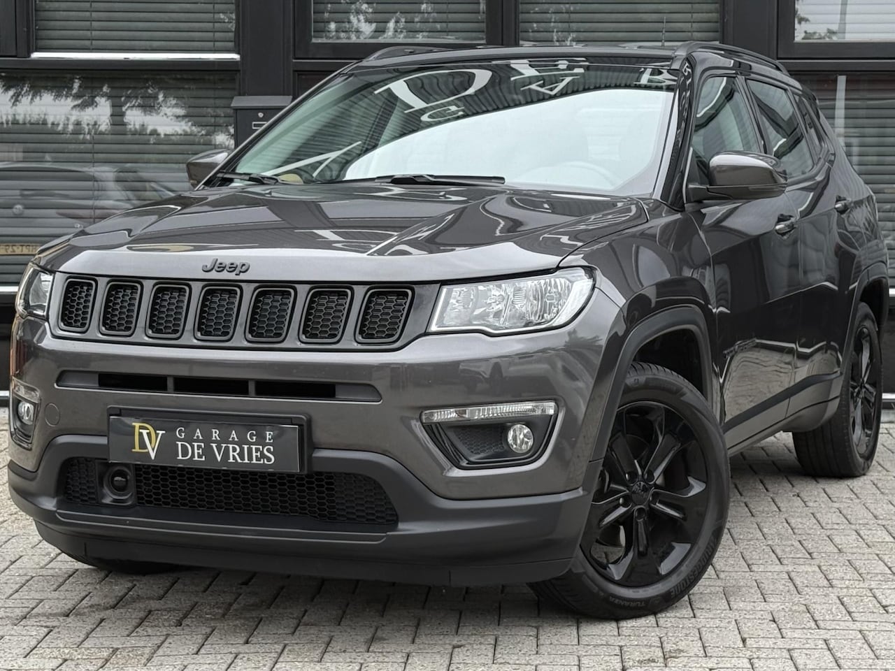 Jeep Compass - 1.4 MultiAir Night Eagle CarPlay Leder Camera Trekhaak Orig NL NAP - AutoWereld.nl