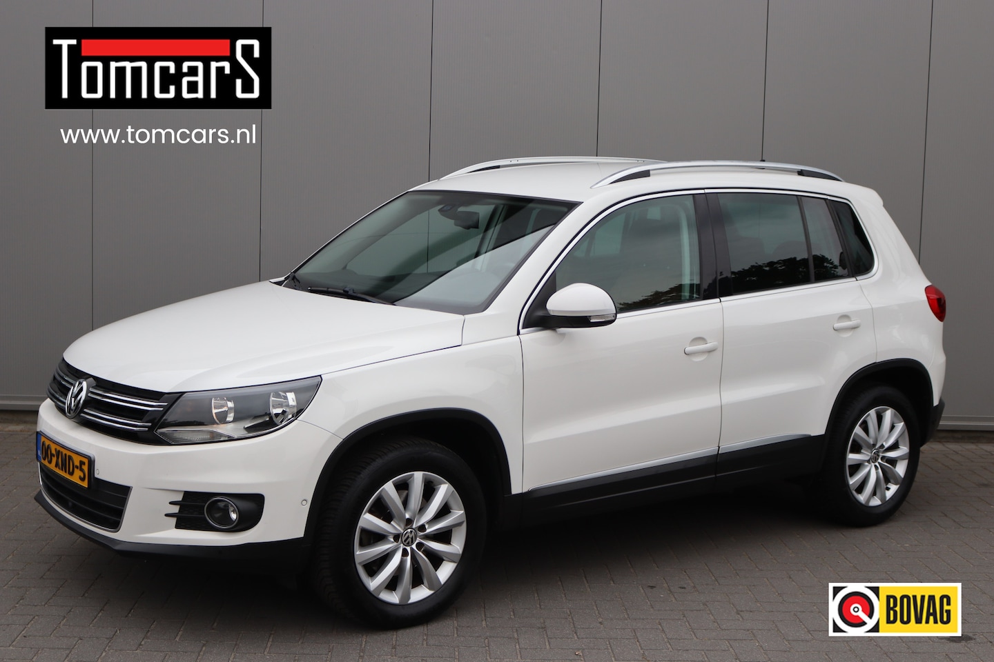 Volkswagen Tiguan - 1.4 TSI Sport&Style Trekhaak/Leder/Parkeerhulp/Cruise-control - AutoWereld.nl