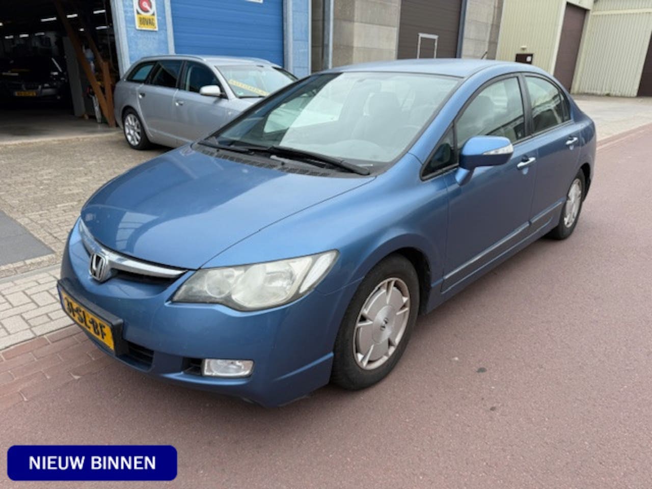 Honda Civic - 1.3 Hybrid 2006 nwe hybride accu APK 10-2025 Leuke auto met veel rekeningen aanwezig. - AutoWereld.nl