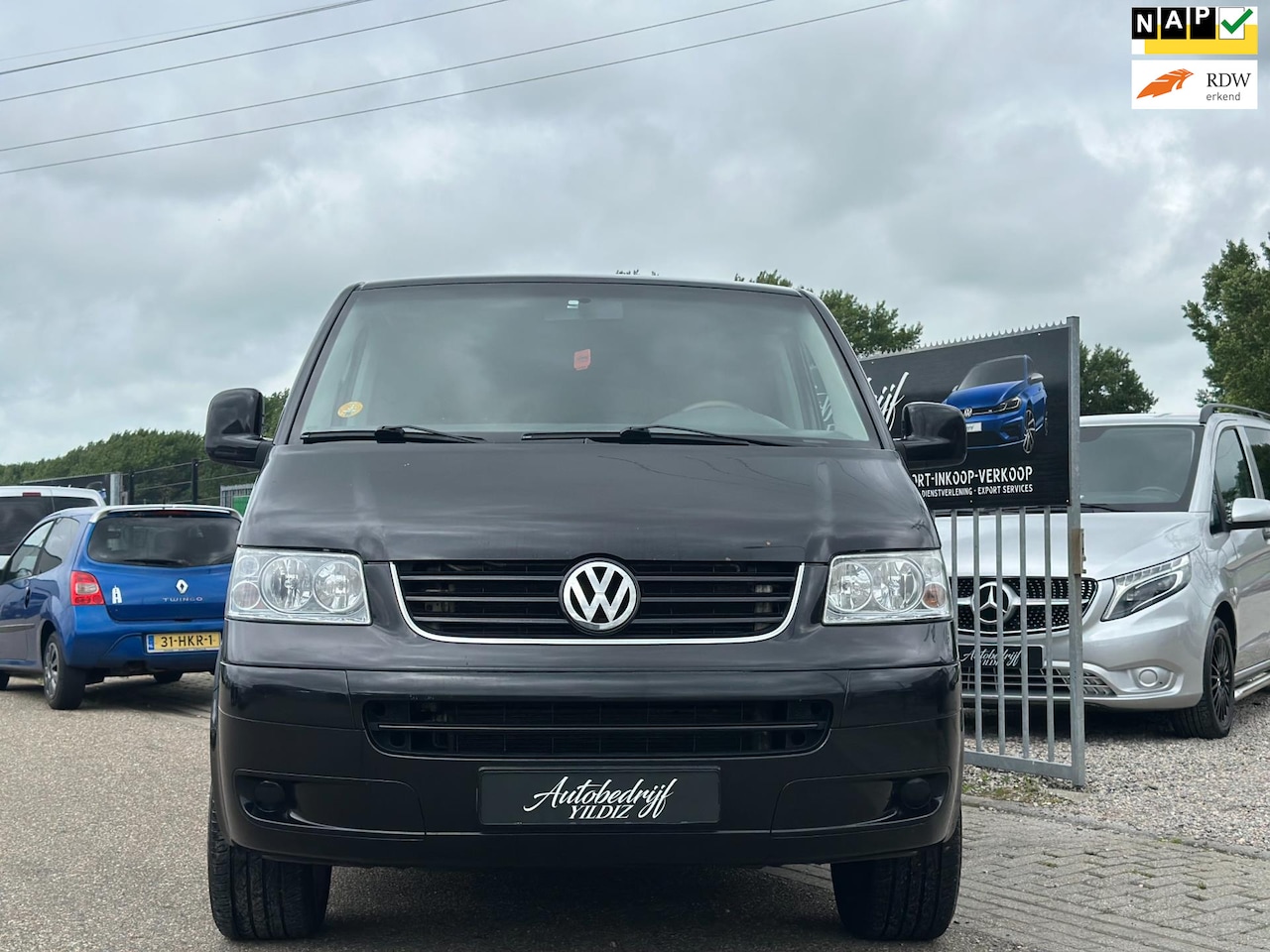 Volkswagen Transporter Caravelle - 2.5 TDI 340 Lang Trendline DC Marge - AutoWereld.nl