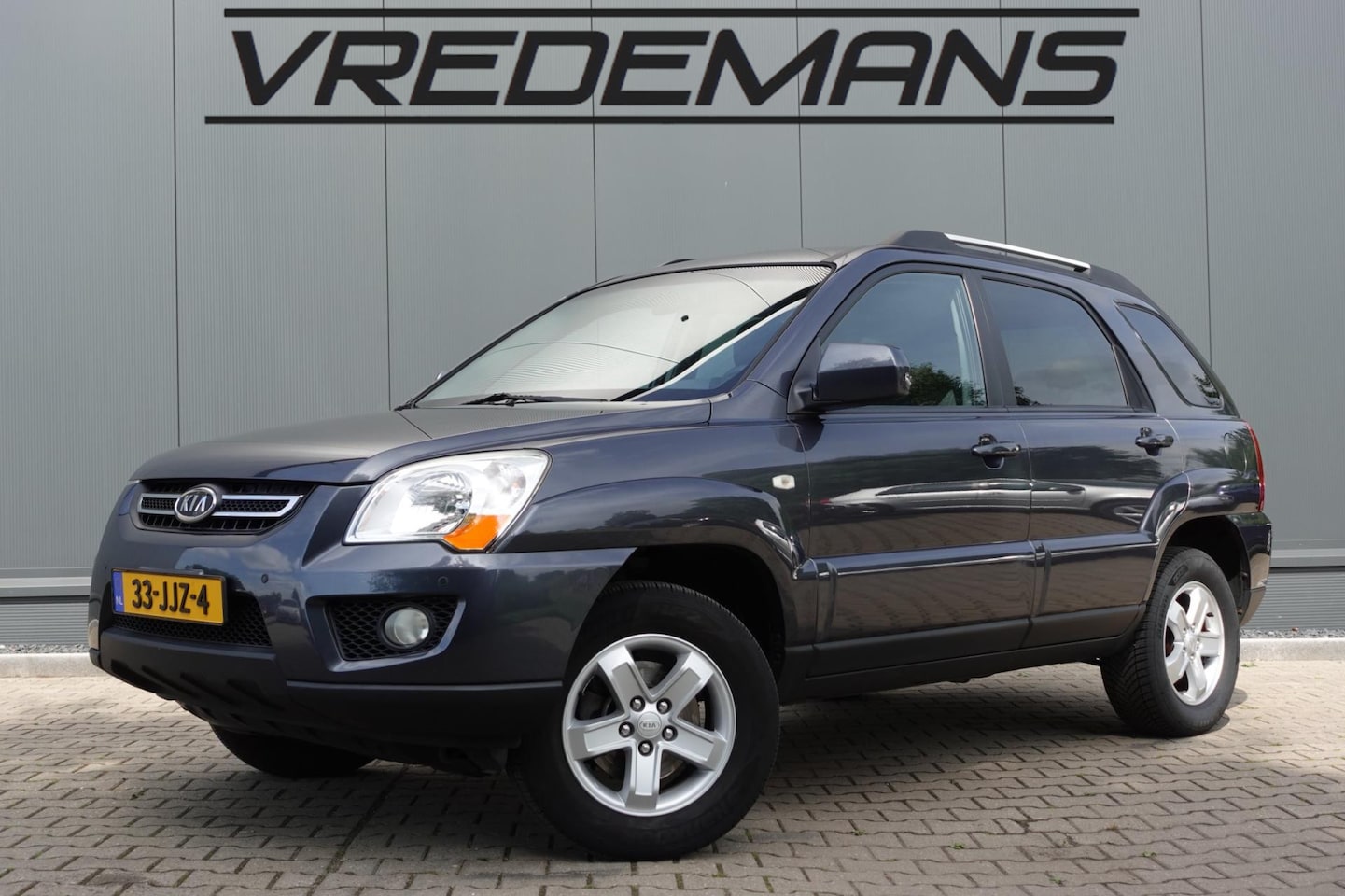 Kia Sportage - 2.0 CVVT X-tra 2.0 CVVT X-tra - AutoWereld.nl