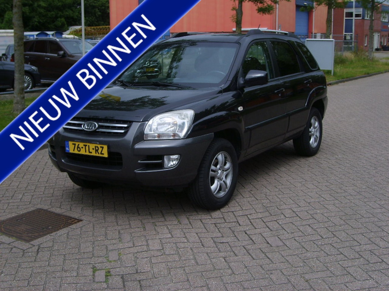 Kia Sportage - 2.0 CVVT Executive 2.0 CVVT Executive ( Badd Ass) - AutoWereld.nl