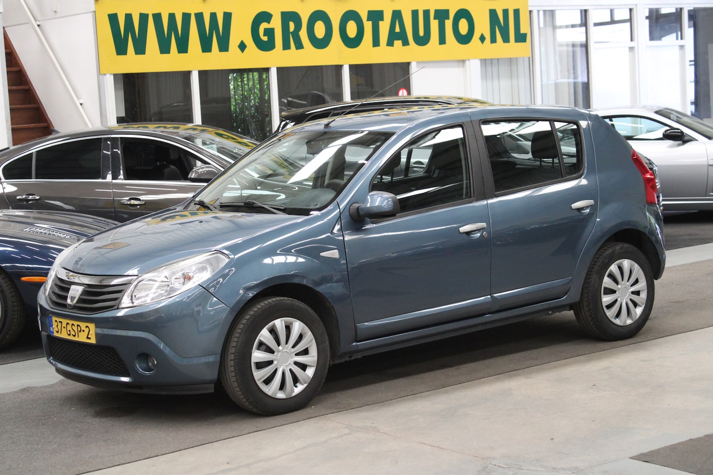 Dacia Sandero - 1.4 Lauréate NAP, Airco, Trekhaak, Stuurbekrachtiging - AutoWereld.nl