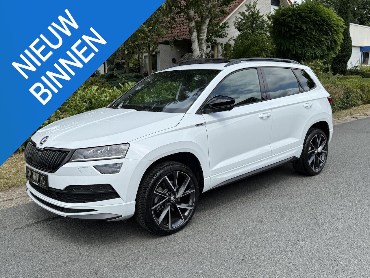 Skoda Karoq - 1.5 TSI 150PK DSG Sportline Pano•Camera - AutoWereld.nl
