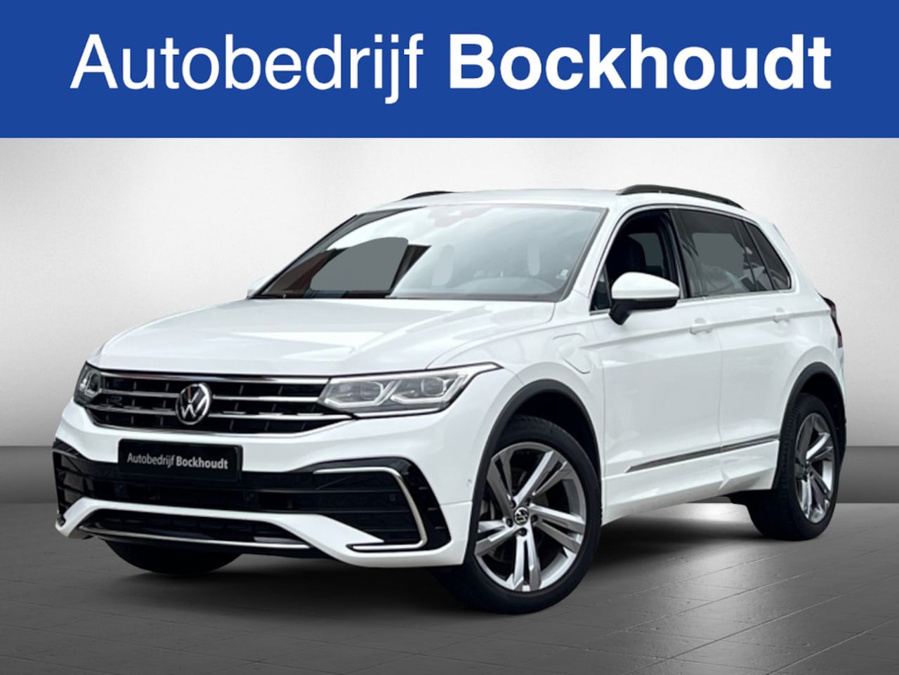 Volkswagen Tiguan - 1.4 TSI eHy R-Line | Navi | Camera | Stoelverwarming - AutoWereld.nl