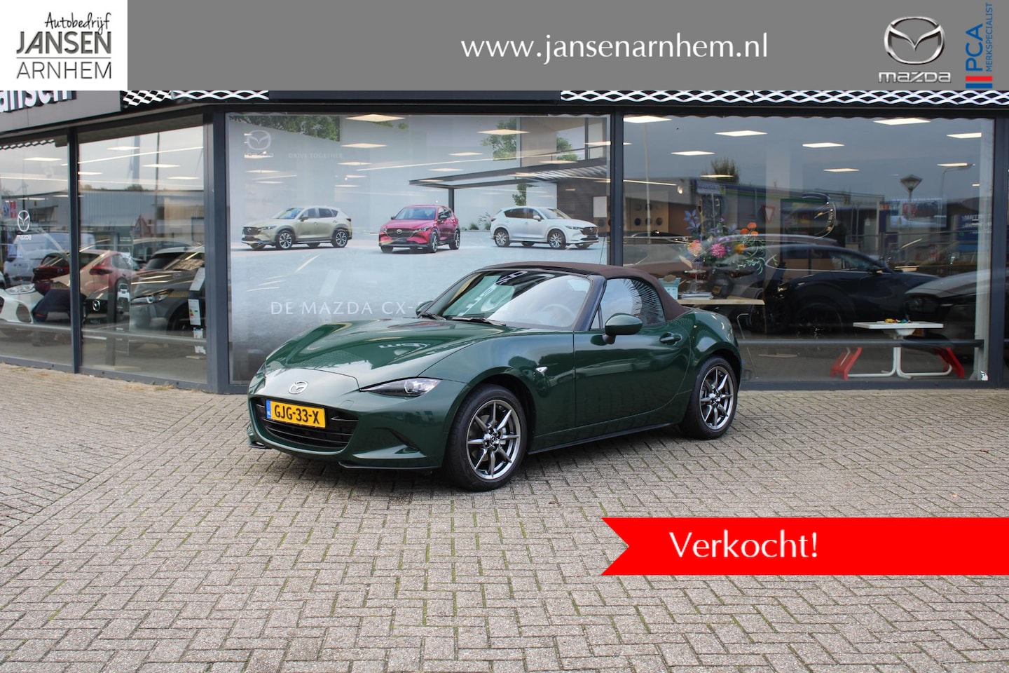 Mazda MX-5 - 1.5 SkyActiv-G 132 Kazari 1.5 SkyActiv-G 132 Kazari , Demovoordeel € 9.790,- , Gewrapped in de kleur Brittish Racing - AutoWereld.nl