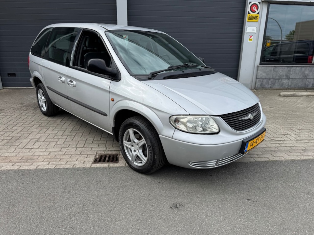 Chrysler Voyager - 3.3i V6 SE Luxe 3.3i V6 SE Luxe - AutoWereld.nl