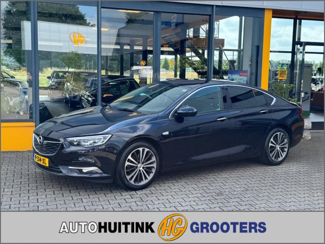Opel Insignia Grand Sport - 1.5 T Grand Sport - leer - adaptive cruis - camera - stoel/stuur verwarming - AutoWereld.nl