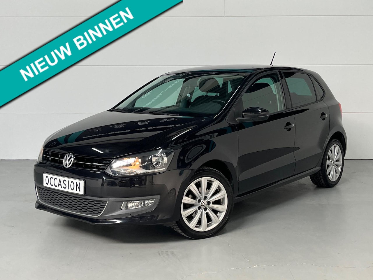 Volkswagen Polo - 1.2 TSI Highline Cruise Climate LM-velgen - AutoWereld.nl