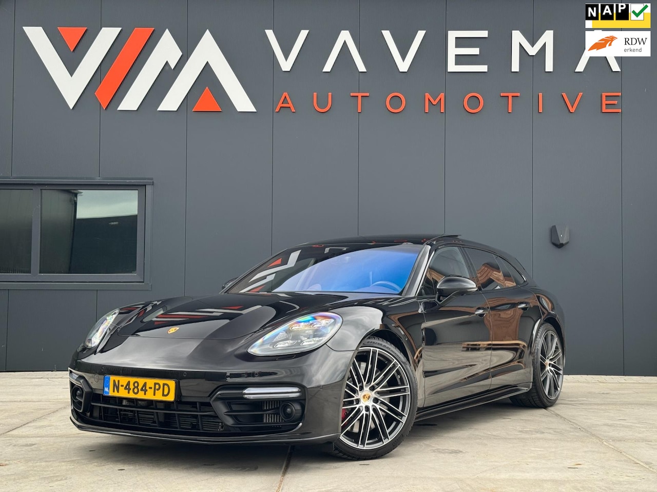 Porsche Panamera Sport Turismo - 4.0 Turbo 2018|Luchtvering|Akrapovic|Massage|Memory|Panodak|Chrono||Rear screens|Softclose - AutoWereld.nl