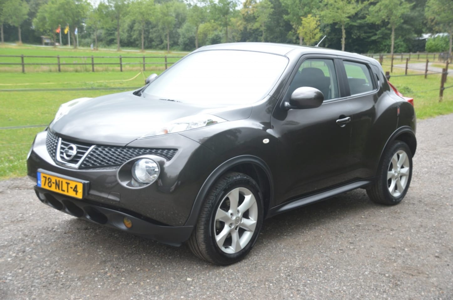 Nissan Juke - 1.6 Acenta Eco Clima Cruise 126.000 km - AutoWereld.nl
