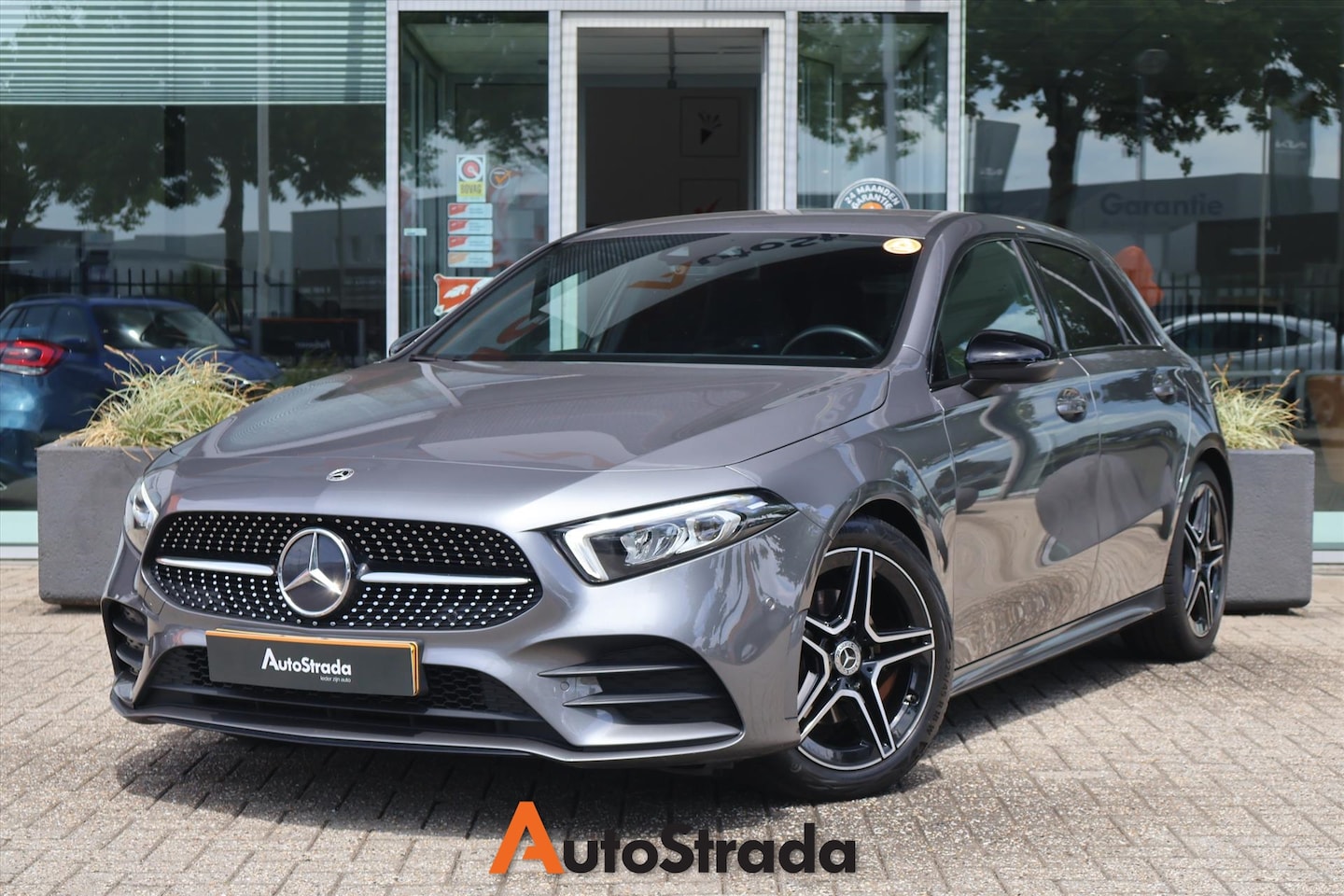 Mercedes-Benz A-klasse - A 180 AMG-Line 136pk 7G-DCT | Camera | Cruise | Climate | Sfeer | Stoelverwarming | LED | - AutoWereld.nl