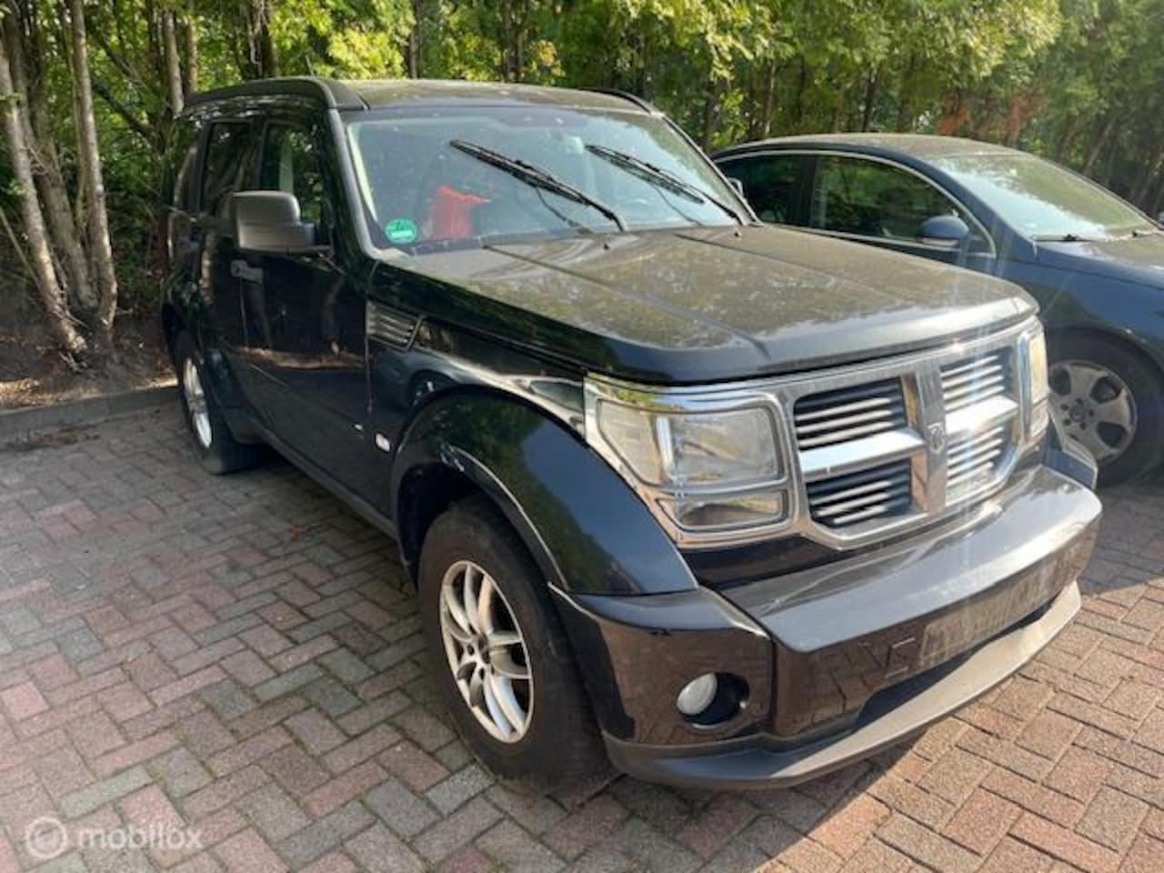Dodge Nitro - 2.8 CRD SXT AUTO LOOPT NIET GEEN IDEE WAT ER MEE IS - AutoWereld.nl