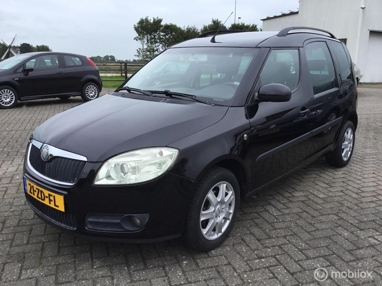 Skoda Roomster - 1.4-16V Style - 97.245 km - AutoWereld.nl