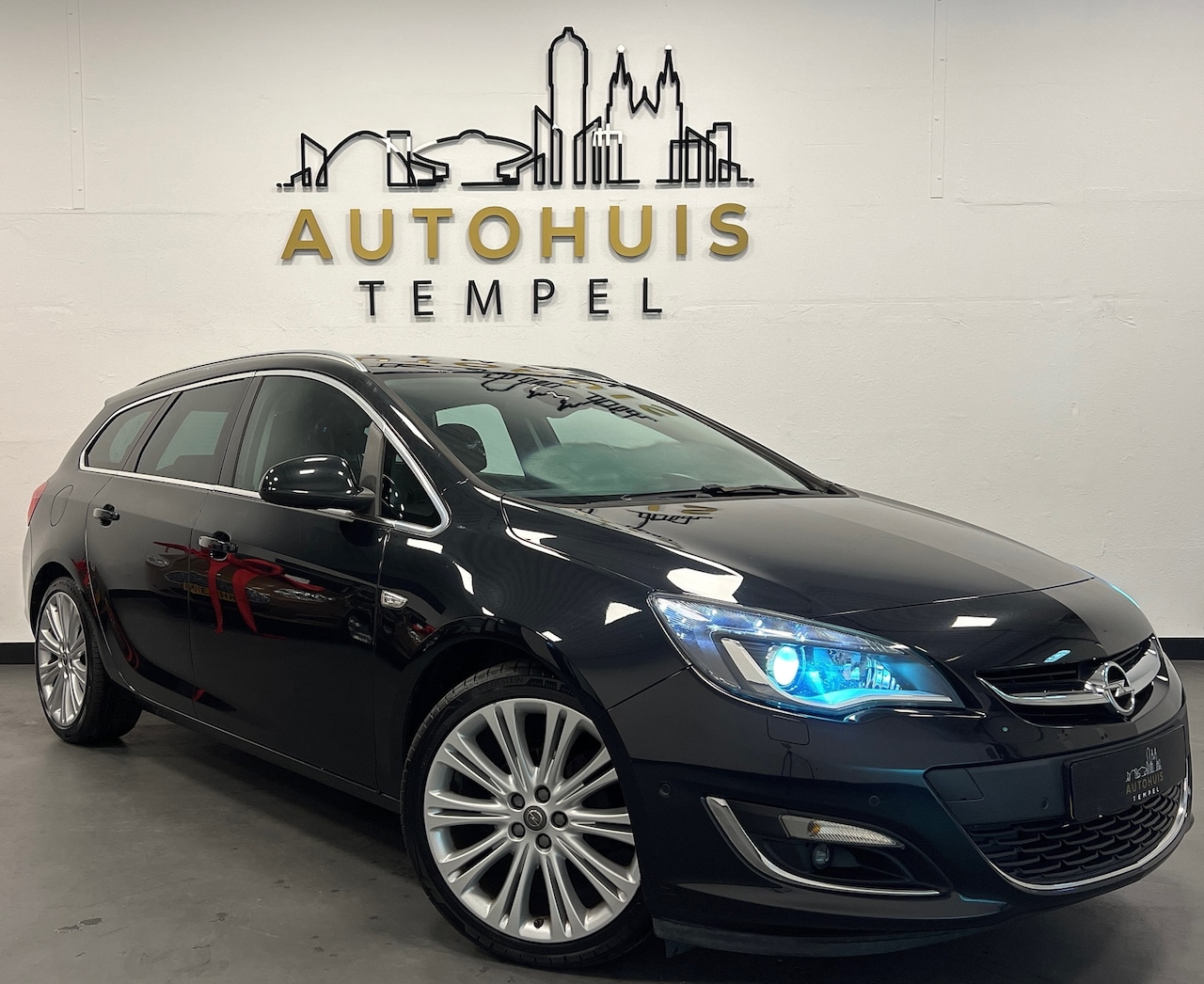 Opel Astra Sports Tourer - 1.4 Turbo Sport + Nap Airco Cruise Leder Stoelverwarming Pdc Camera - AutoWereld.nl