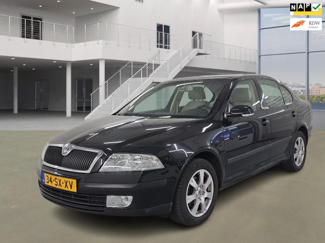 Skoda Octavia - 1.9 TDI Elegance/lage km met nap/psensor/airco/trekhaak/ - AutoWereld.nl