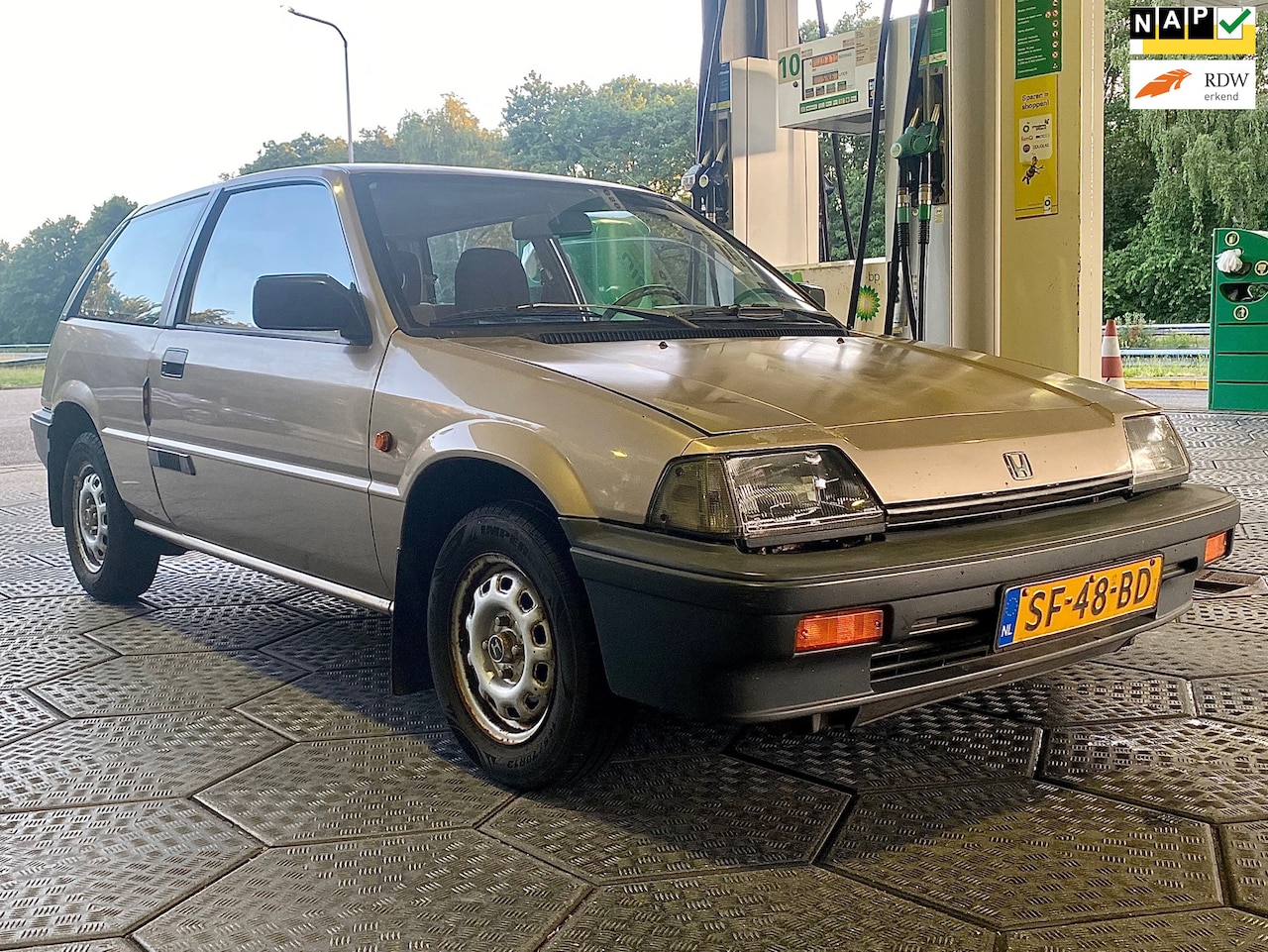 Honda Civic - 1.3 Luxe Automaat (1e Eigenaar) N.A.P - AutoWereld.nl