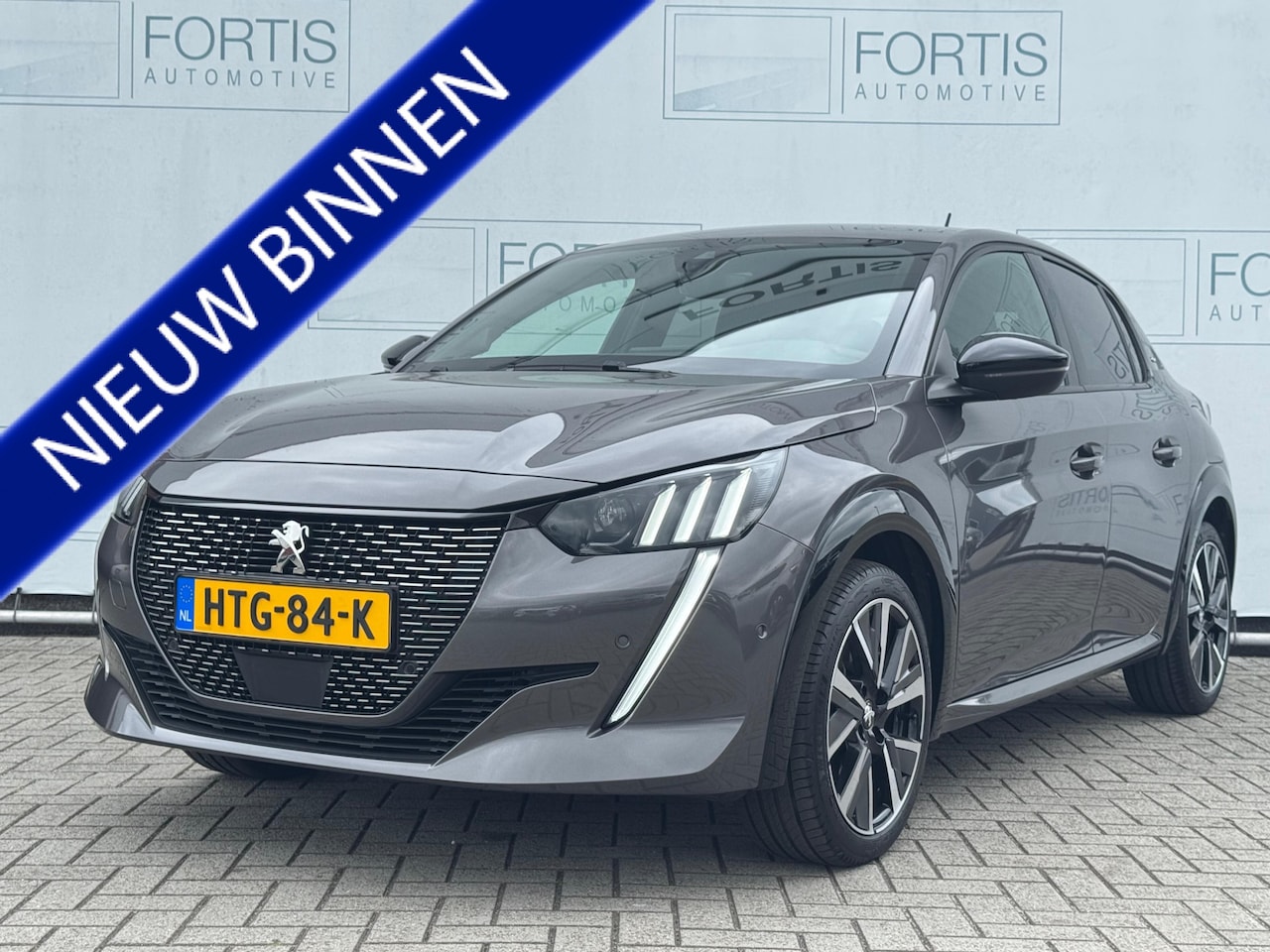 Peugeot 208 - 1.2 PureTech GT NAVI | CARPLAY | 1/2 LEDER - AutoWereld.nl