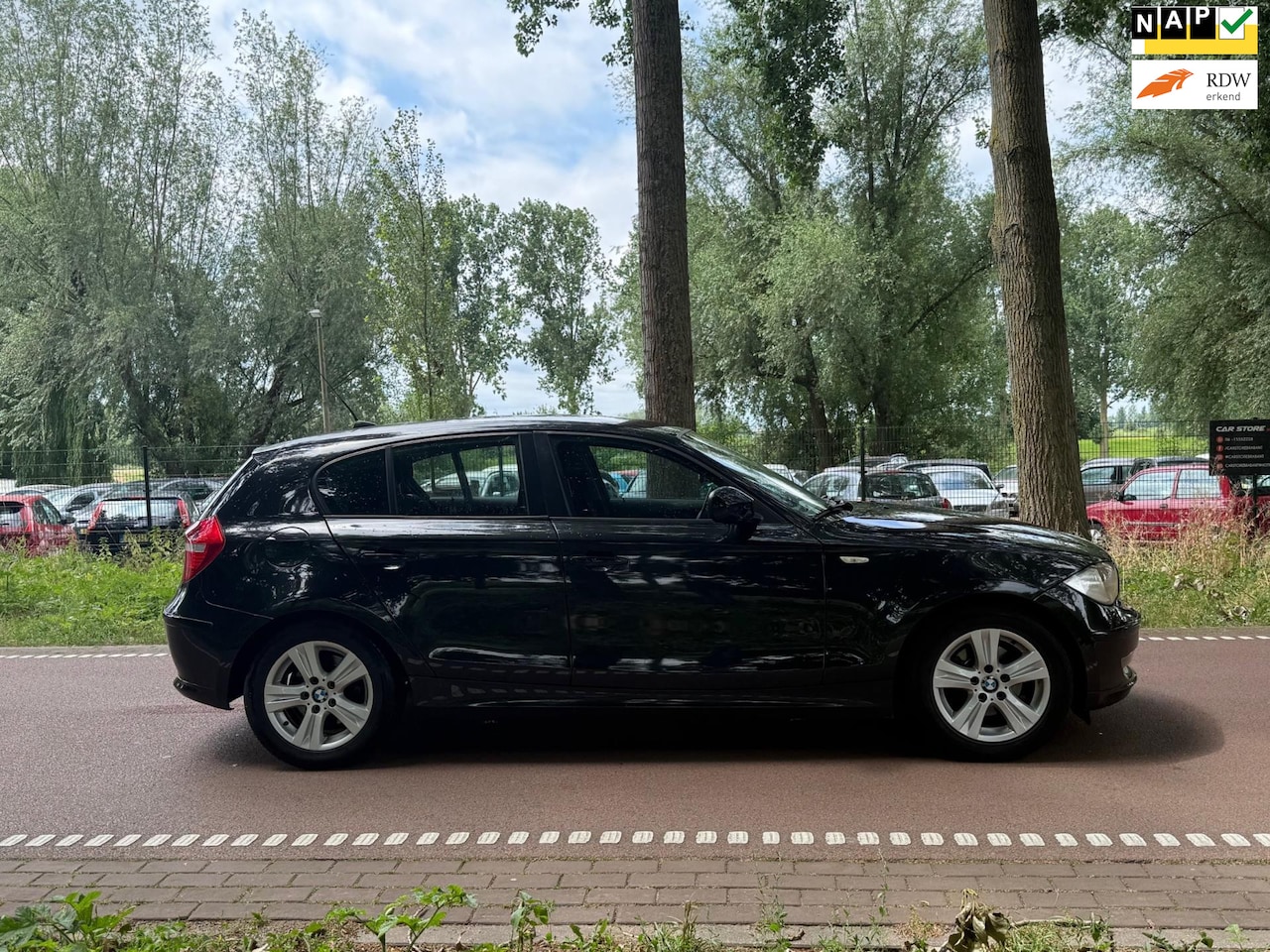 BMW 1-serie - 118i Business Line Style AIRCO!NAVI!5DEURS!APK2026! - AutoWereld.nl