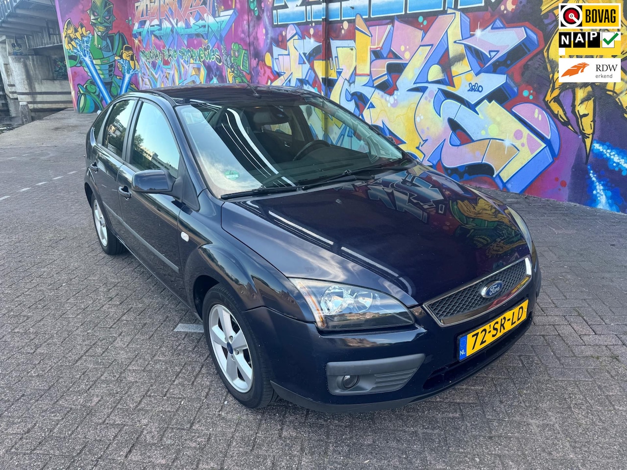 Ford Focus - 2.0-16V Futura navigatie digitale airco voorraam verwarming sport wielen apk okt rijd goed - AutoWereld.nl