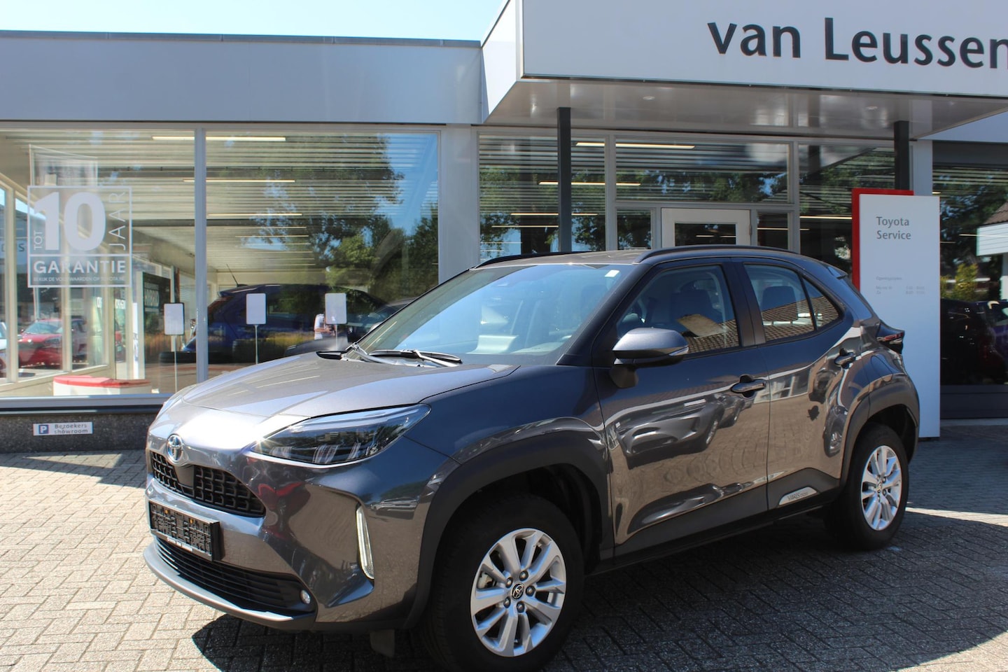 Toyota Yaris Cross - 1.5 Hybrid 115 DYNAMIC STOEL/STUUR&WISSERVERW. EL.A.KLEP LED KEYLESS AD-CRUISE - AutoWereld.nl