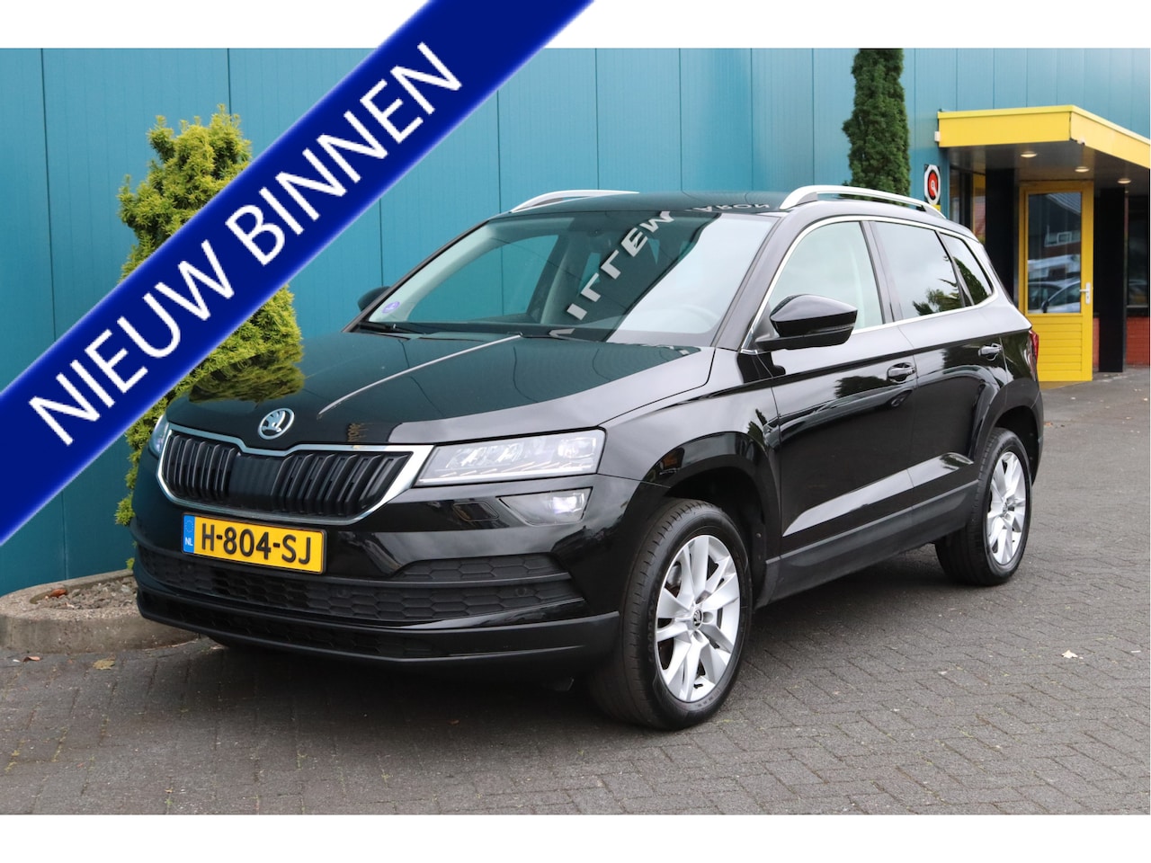 Skoda Karoq - 1.0 TSI Business Edition CARPLAY|TREKH|NAV|CAM|LED|CLIMA|PDC|LMV - AutoWereld.nl