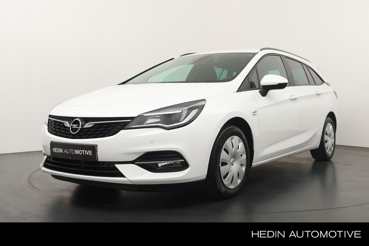 Opel Astra Sports Tourer - 1.2 130pk Business Edition | Trekhaak | Navigatie | Parkeer Camera | Cruise Control | - AutoWereld.nl