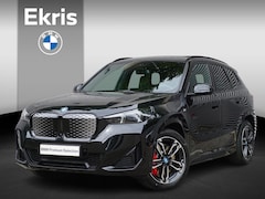 BMW iX1 - eDrive20 M Sportpakket Pro | Travel Pack | 19 inch LM M Dubbelspaak (Styling 871 M) | Trek