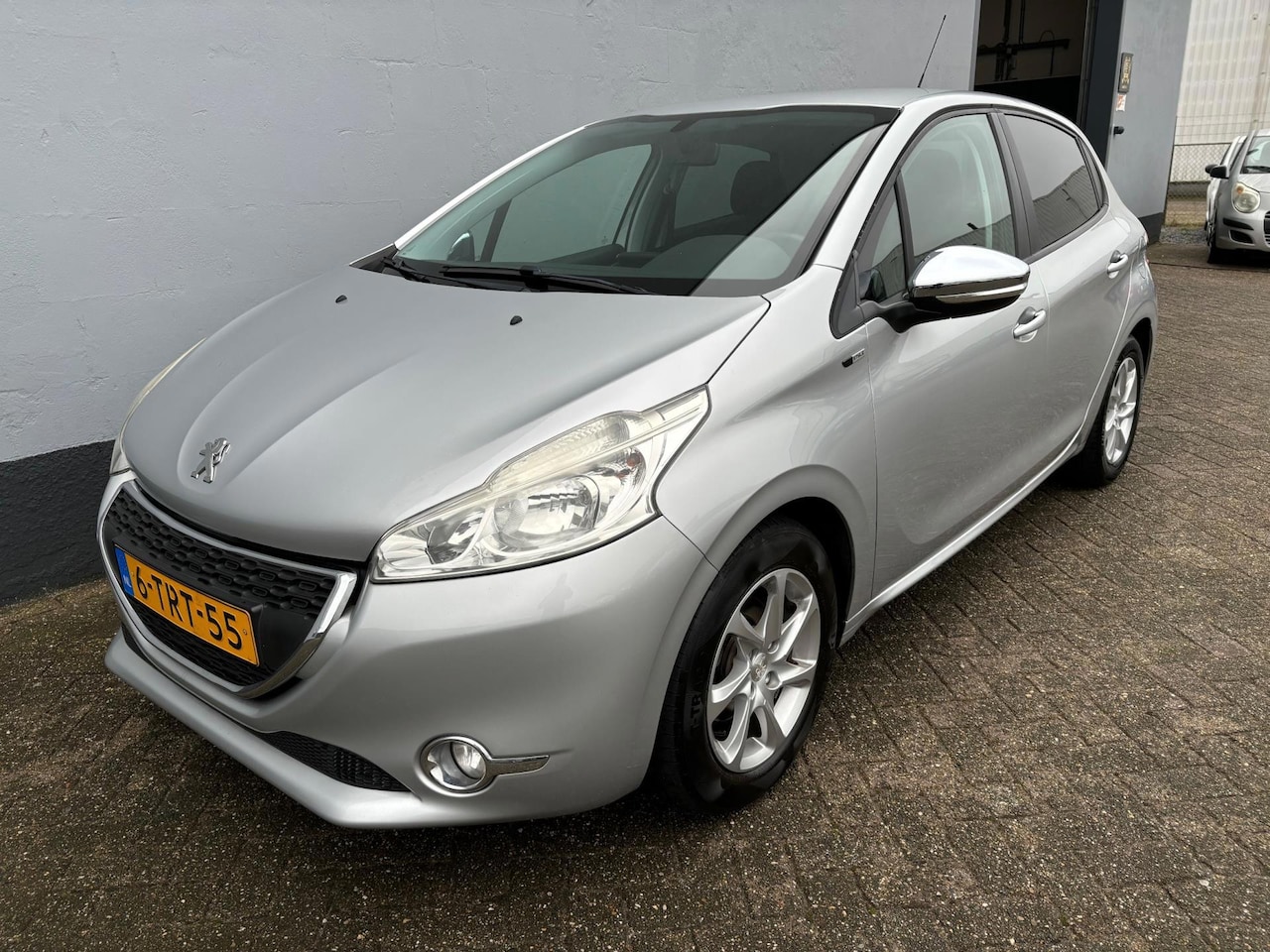 Peugeot 208 - 1.2 VTi Style - Airco - Cruise - AutoWereld.nl