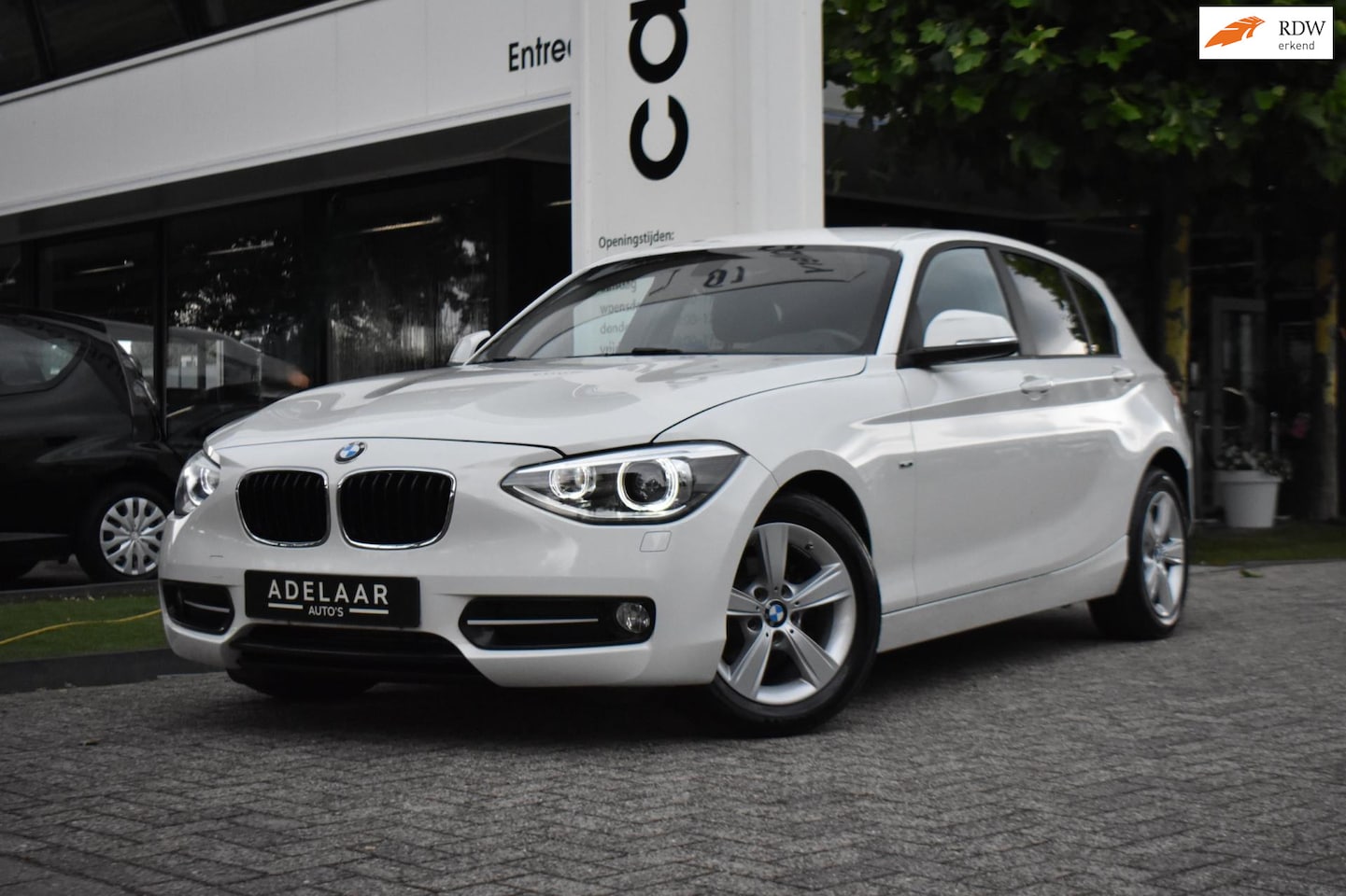 BMW 1-serie - 114i Sport, XENON, CRUISE, STOELVERWARMING, PDC, KEYLESS START - AutoWereld.nl