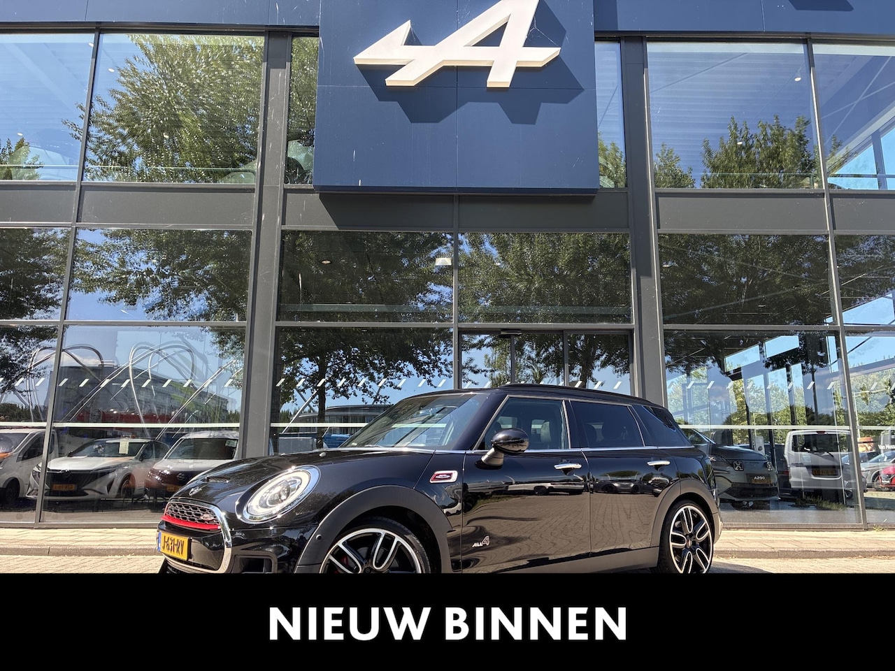 MINI Clubman - Mini 2.0 John Cooper Works ALL4 Chili JCW | PANORAMADAK | HEAD UP | HARMAN KARDON | VERW. - AutoWereld.nl