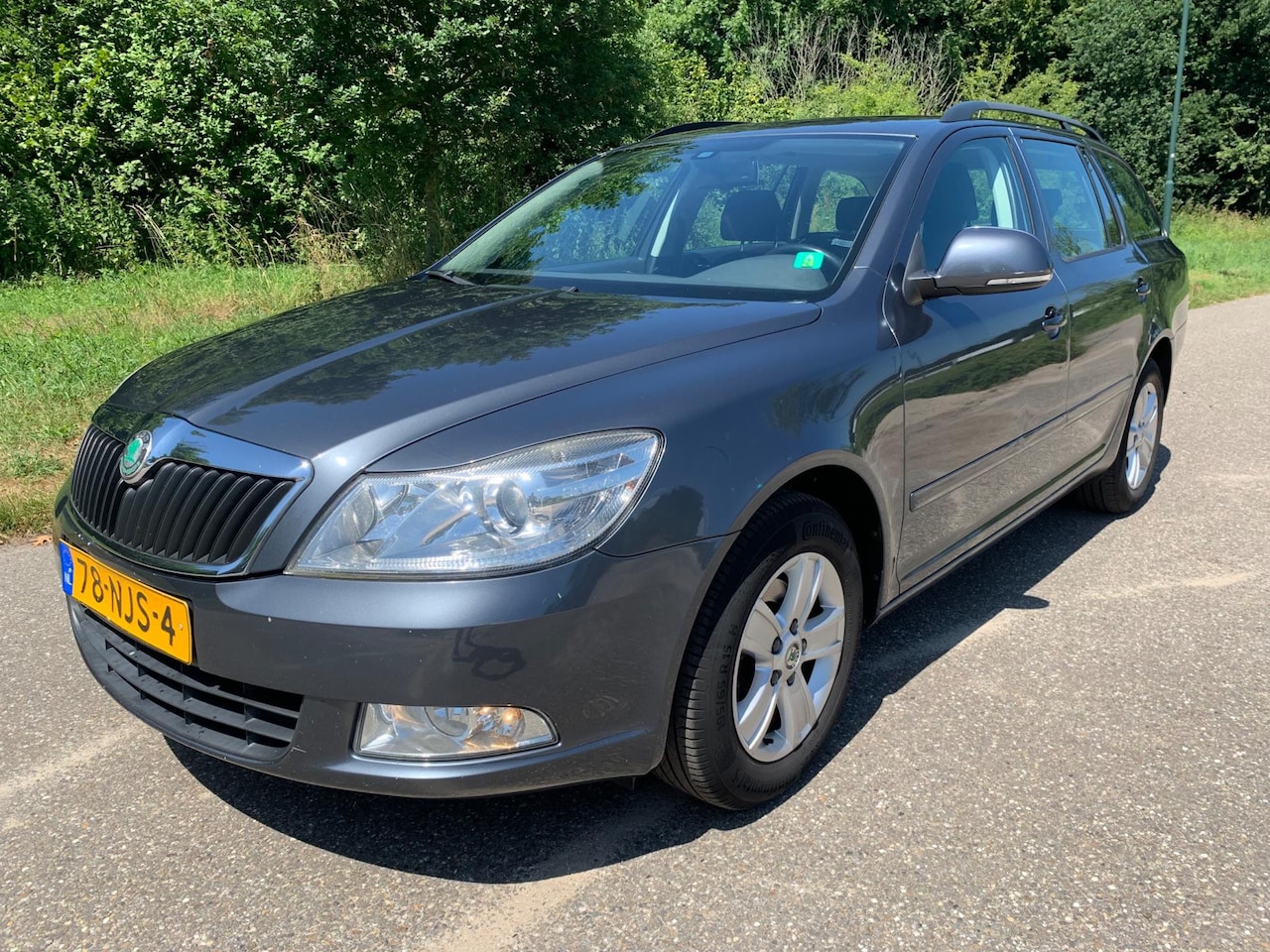 Skoda Octavia Combi - 1.2 TSI Ambition Business Line Navigatie- Clima- Trekhaak- Lmv. - AutoWereld.nl