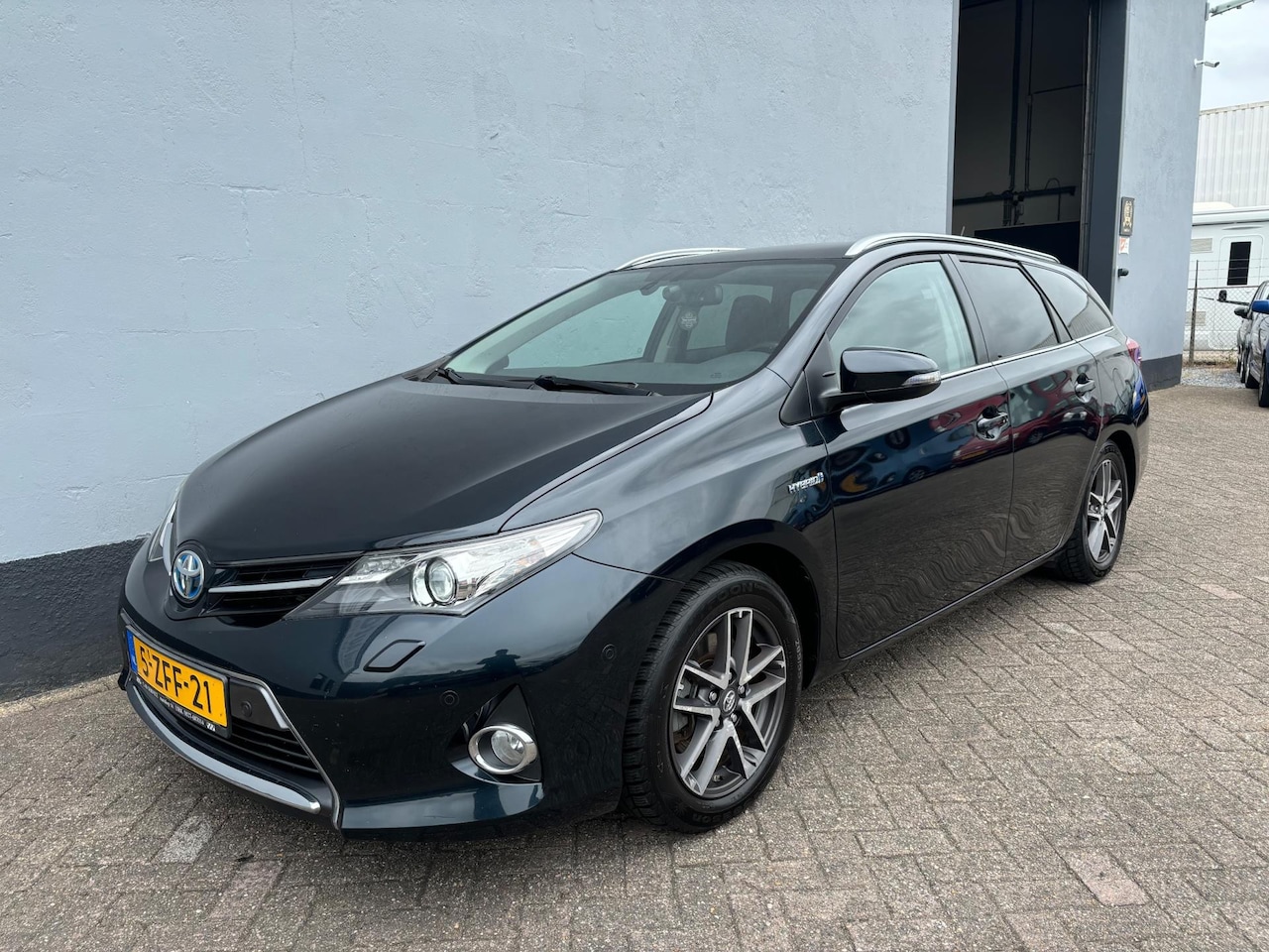 Toyota Auris Touring Sports - 1.8 Hybrid Lease - Panorama - Navigatie - AutoWereld.nl