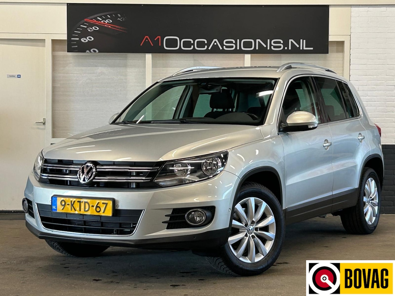 Volkswagen Tiguan - 1.4 TSI Sport&Style + NAVI - AutoWereld.nl